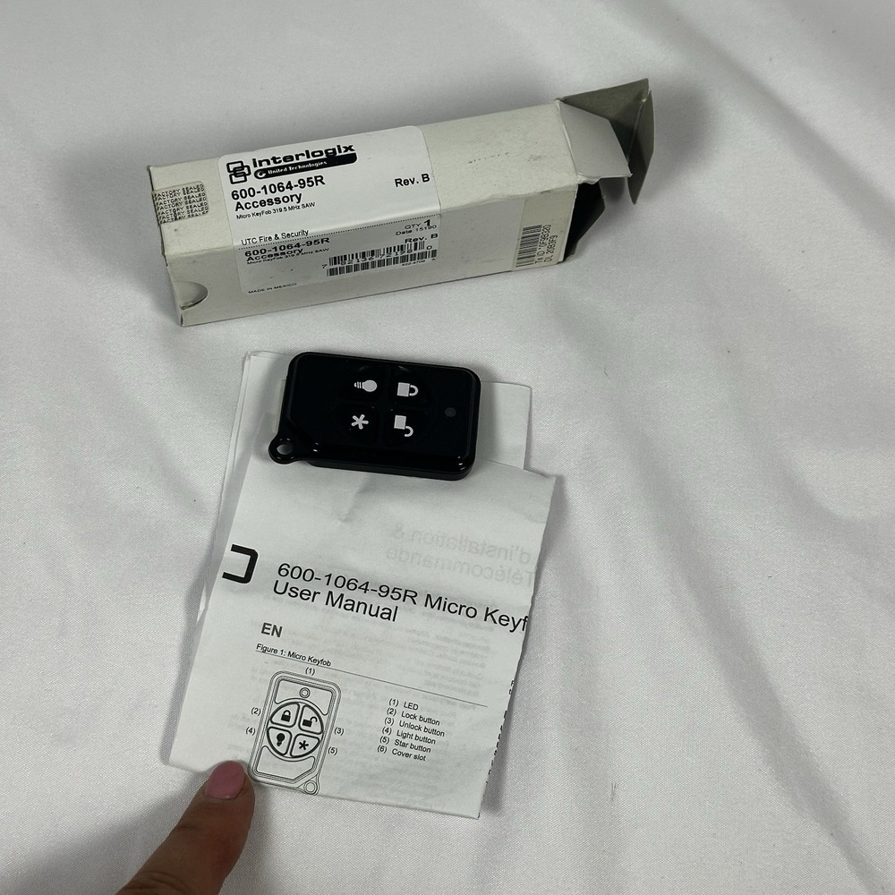 New GE Interlogix 600-1064-95R  Four Button Wireless Remote Key-fob NEW